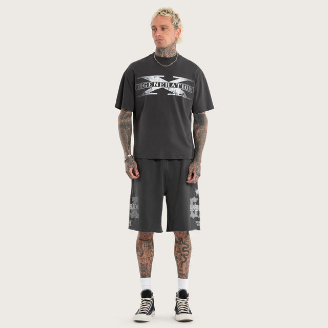 Model wears D-Generation X Loopback Trackshort Pigment Black Trackshorts Black – image 4