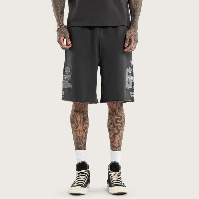Model wears D-Generation X Loopback Trackshort Pigment Black Trackshorts Black – image 8