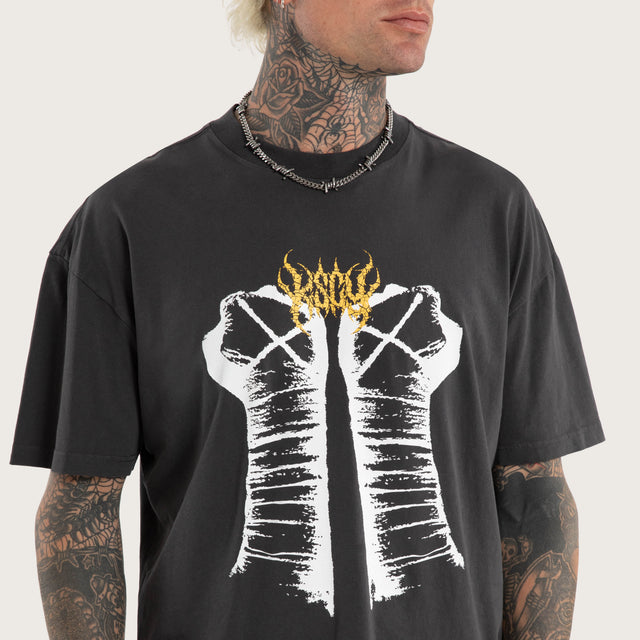 Model wears CM Punk Rage Raptor Tee Pigment Black T-Shirts Black – image 3