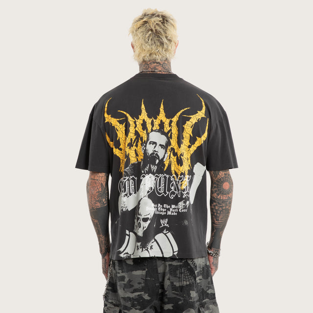 Model wears CM Punk Rage Raptor Tee Pigment Black T-Shirts Black – image 2
