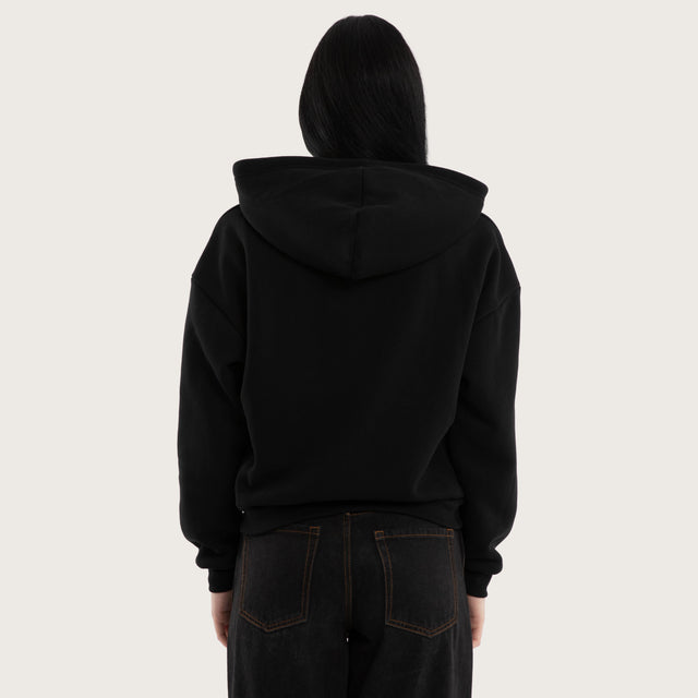 Model wears Caterina Street Zip Hoodie Jet Black Hoodies Black – image 3