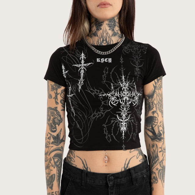 Model wears Luke Walker Lucid Baby Tee Jet Black T-Shirts in Black - Image 2