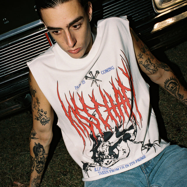Model wears Rip Mechanic Muscle Natural White Muscle Tees in White - Image 4